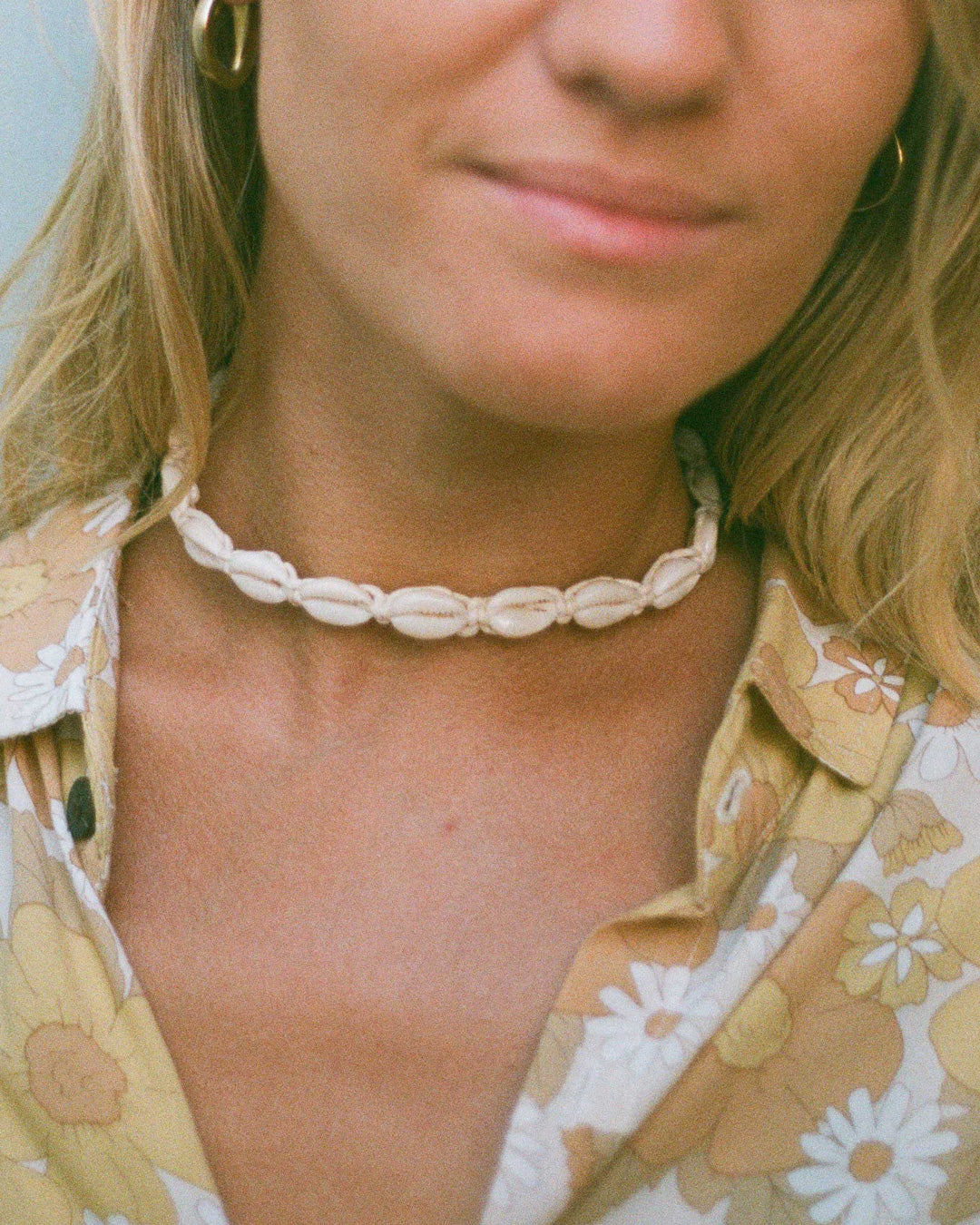 collier cauri blanc